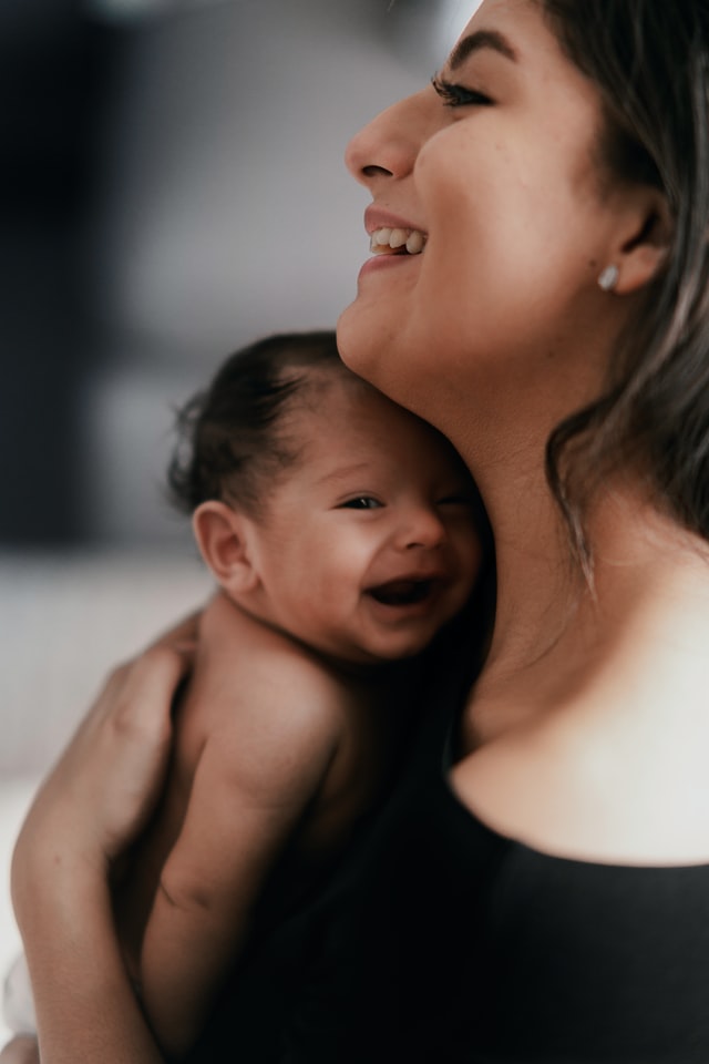 Mother with its baby boy
