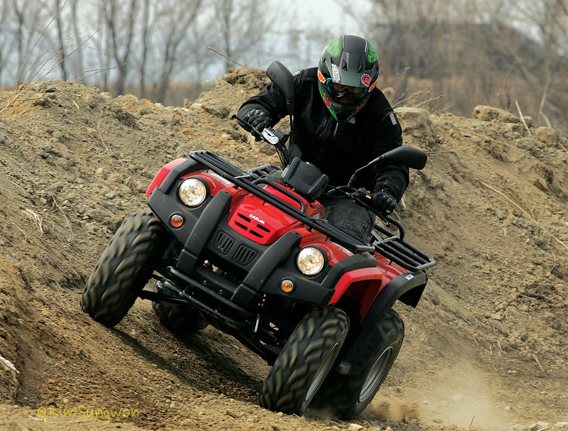 a person riding an ATV
