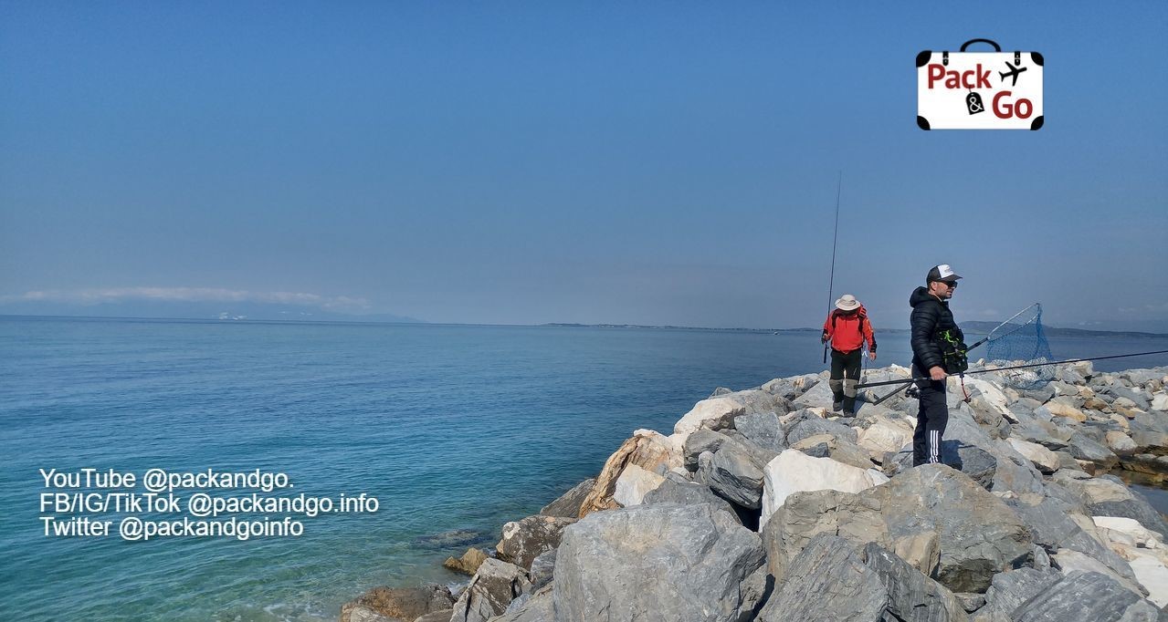 Fishermen at Fanari beach, Greece