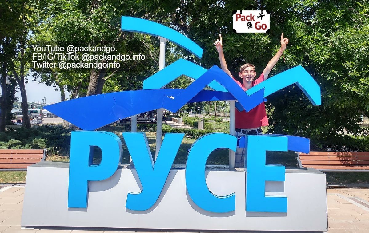 Ruse touristic sign with a happy man